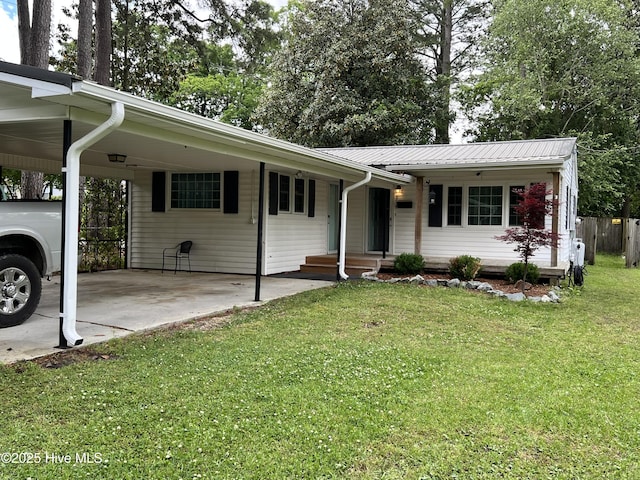 214 S Graham St, Wallace, NC 28466 - view of front of property featuring an attached carport and metal roof