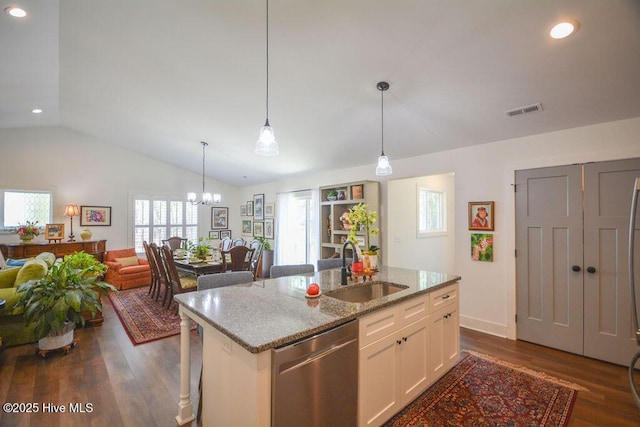 kitchen featuring a sink, open floor plan, dark wood-type flooring, visible vents, and dishwasher
