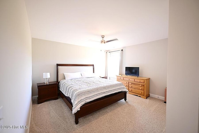 911 Needlerush Rd, Sneads Ferry, NC 28460 - bedroom with light carpet, baseboards, and a ceiling fan
