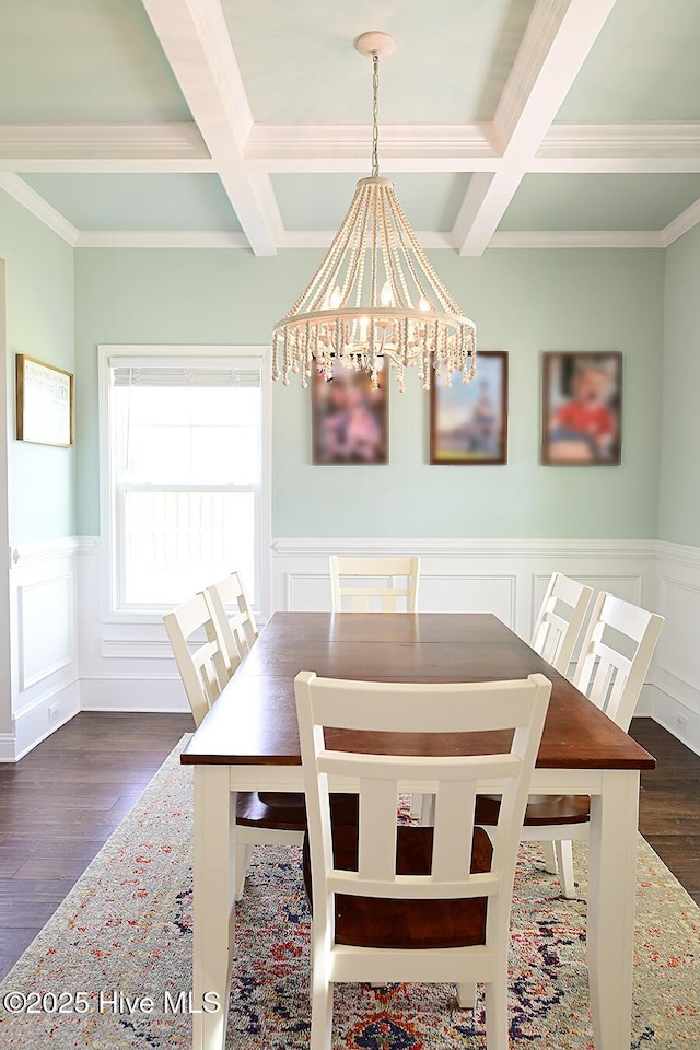 911 Needlerush Rd, Sneads Ferry, NC 28460 - dining area featuring coffered ceiling, a chandelier, beamed ceiling, dark wood finished floors, and a decorative wall