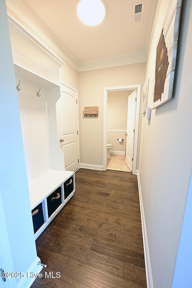 911 Needlerush Rd, Sneads Ferry, NC 28460 - mudroom with crown molding, dark wood-type flooring, and baseboards
