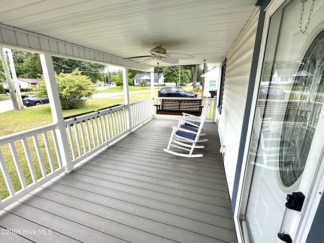 706 E Country Club Dr, Tarboro, NC 27886 - deck featuring a ceiling fan, a yard, and a porch