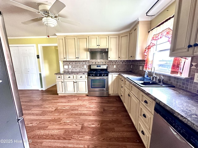 706 E Country Club Dr, Tarboro, NC 27886 - kitchen with a sink, wood finished floors, cream cabinetry, and appliances with stainless steel finishes