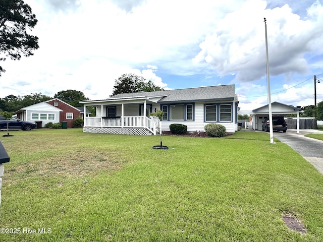 706 E Country Club Dr, Tarboro, NC 27886 - view of front of home featuring driveway, a porch, roof with shingles, and a front lawn