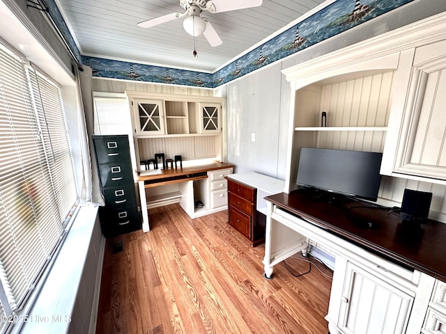 706 E Country Club Dr, Tarboro, NC 27886 - home office featuring light wood finished floors, built in study area, and ceiling fan