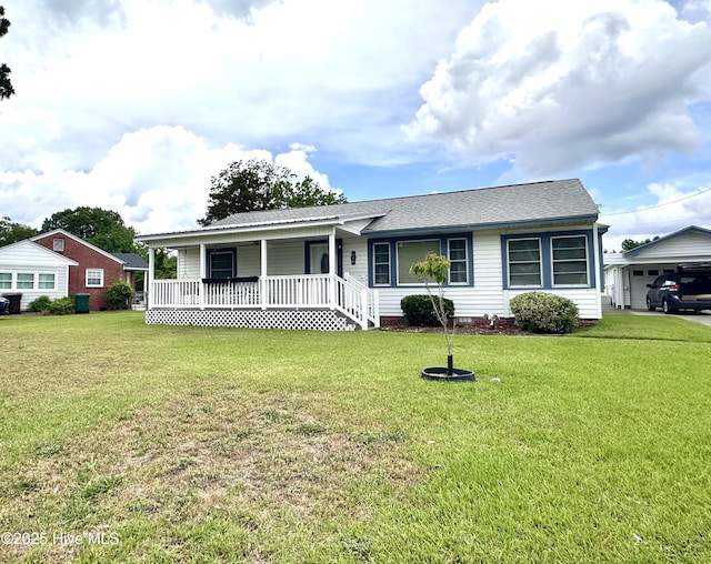 706 E Country Club Dr, Tarboro, NC 27886 - ranch-style home featuring covered porch, a shingled roof, and a front yard