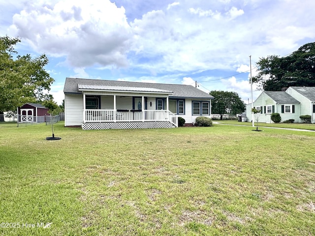 706 E Country Club Dr, Tarboro, NC 27886 - view of front of home with a porch, a shingled roof, and a front lawn