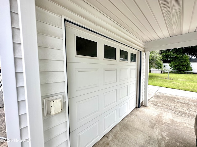 706 E Country Club Dr, Tarboro, NC 27886 - garage with driveway and fence