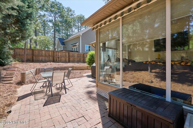 4 Brunswick Ln, Pinehurst, NC 28374 - view of patio / terrace featuring outdoor dining space and fence
