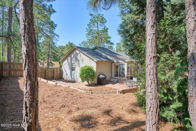 4 Brunswick Ln, Pinehurst, NC 28374 - back of house featuring a patio area and fence