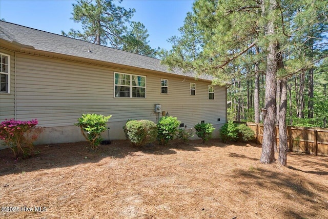 4 Brunswick Ln, Pinehurst, NC 28374 - view of side of property featuring fence and crawl space