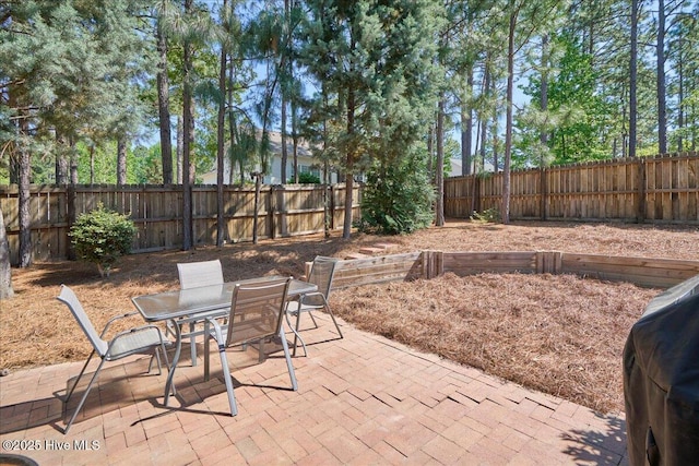 4 Brunswick Ln, Pinehurst, NC 28374 - view of patio / terrace with outdoor dining area and a fenced backyard
