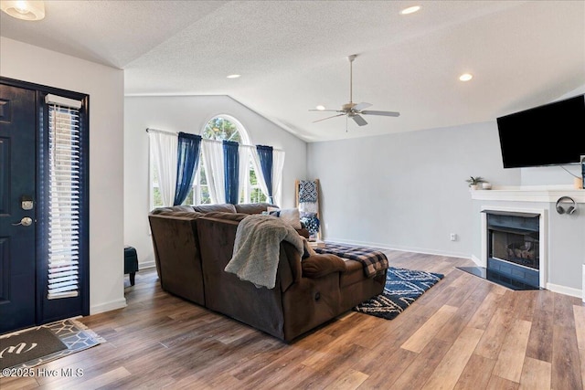4 Brunswick Ln, Pinehurst, NC 28374 - hall with wood finished floors, a textured ceiling, and baseboards