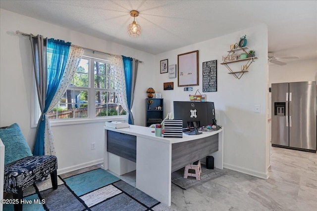 4 Brunswick Ln, Pinehurst, NC 28374 - office area featuring baseboards, light marble finish floors, a ceiling fan, and a textured ceiling