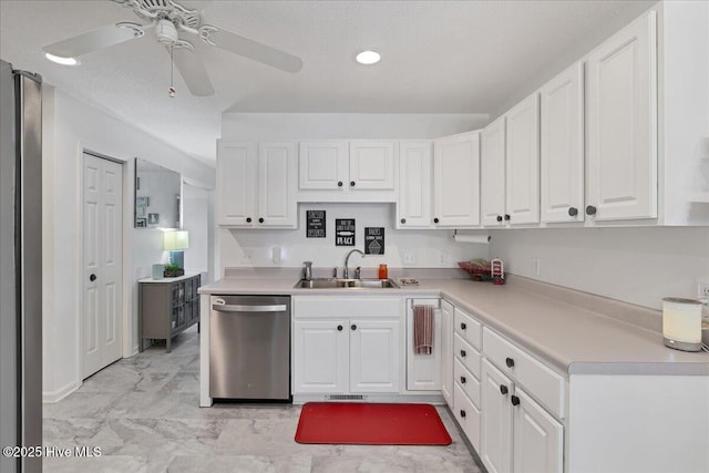 4 Brunswick Ln, Pinehurst, NC 28374 - kitchen with dishwasher, a sink, white cabinetry, ceiling fan, and light countertops