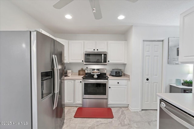 4 Brunswick Ln, Pinehurst, NC 28374 - kitchen with stainless steel fridge with ice dispenser, white cabinetry, ceiling fan, a sink, and light countertops