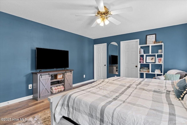 4 Brunswick Ln, Pinehurst, NC 28374 - bedroom featuring light wood-style floors, baseboards, and a ceiling fan