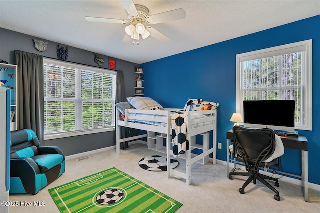 4 Brunswick Ln, Pinehurst, NC 28374 - carpeted bedroom featuring baseboards, ceiling fan, and a textured ceiling