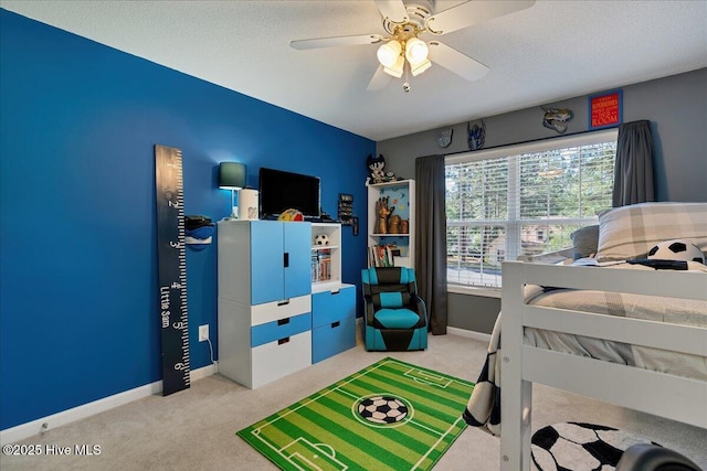 4 Brunswick Ln, Pinehurst, NC 28374 - bedroom featuring light carpet, baseboards, a ceiling fan, and a textured ceiling