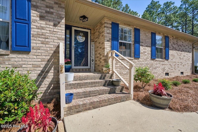 4 Brunswick Ln, Pinehurst, NC 28374 - view of exterior entry featuring crawl space and brick siding