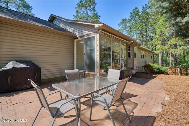 4 Brunswick Ln, Pinehurst, NC 28374 - view of patio featuring area for grilling and outdoor dining space