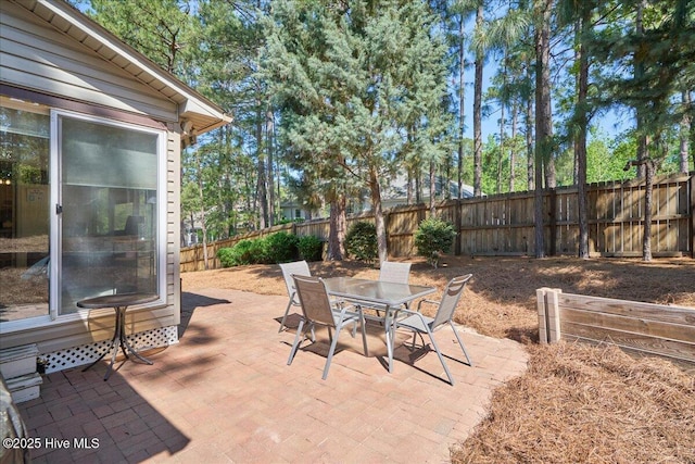 4 Brunswick Ln, Pinehurst, NC 28374 - view of patio / terrace featuring a fenced backyard and outdoor dining area