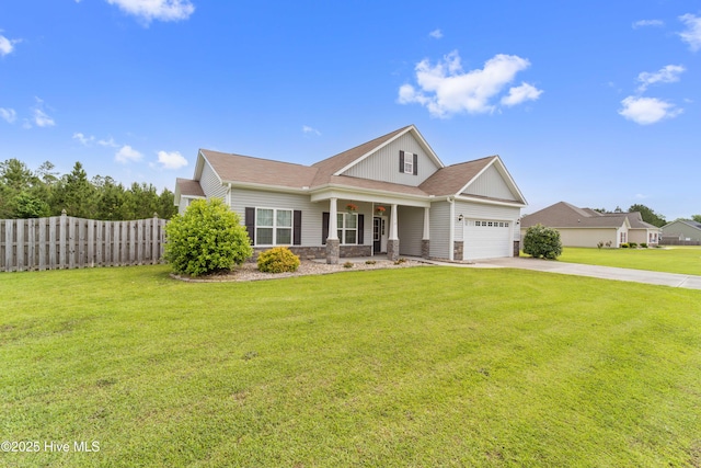 craftsman inspired home featuring an attached garage, fence, concrete driveway, board and batten siding, and a front lawn