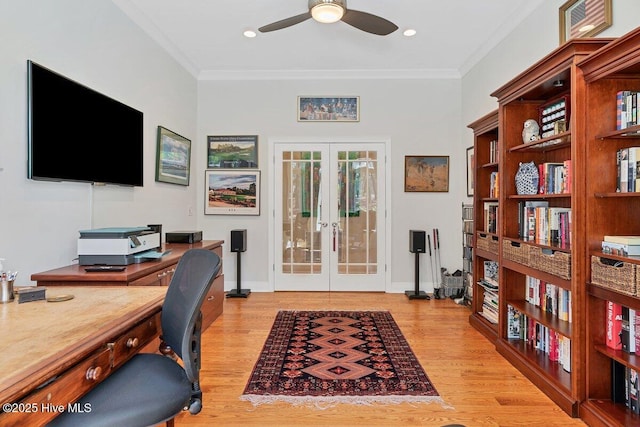 home office featuring french doors, ceiling fan, light wood finished floors, crown molding, and baseboards