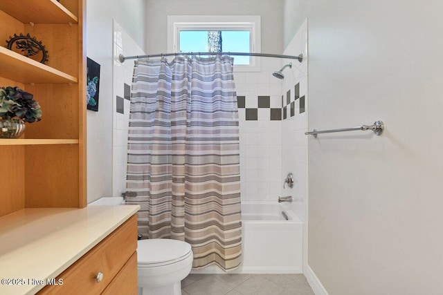 full bathroom featuring shower / bath combination with curtain, tile patterned flooring, toilet, and vanity