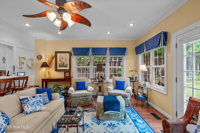 104 N Reed Dr, Washington, NC 27889 - living room with wood finished floors, a ceiling fan, baseboards, ornamental molding, and recessed lighting