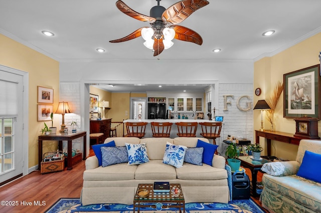 104 N Reed Dr, Washington, NC 27889 - living room with wood finished floors, a ceiling fan, recessed lighting, crown molding, and baseboards