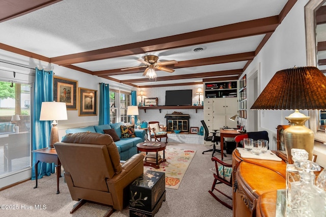 104 N Reed Dr, Washington, NC 27889 - carpeted living area with beam ceiling, a ceiling fan, and a textured ceiling