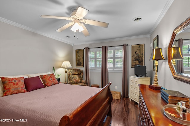 104 N Reed Dr, Washington, NC 27889 - bedroom featuring multiple windows, dark wood-style floors, ornamental molding, a ceiling fan, and baseboards