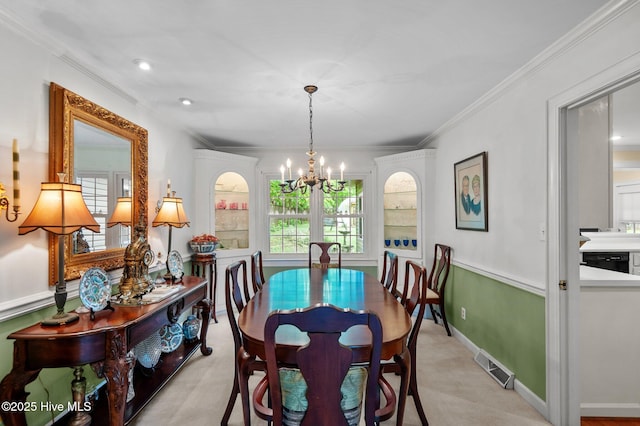 104 N Reed Dr, Washington, NC 27889 - dining area with a chandelier and crown molding