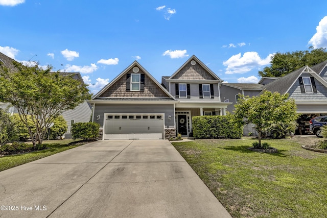 view of front facade featuring concrete driveway, a front lawn, and stone siding