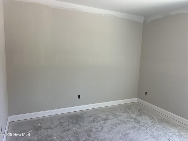 502 Hadnot Ave, Maysville, NC 28555 - unfurnished room with unfinished concrete floors and baseboards