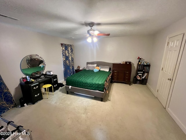 bedroom with carpet floors, ceiling fan, and baseboards