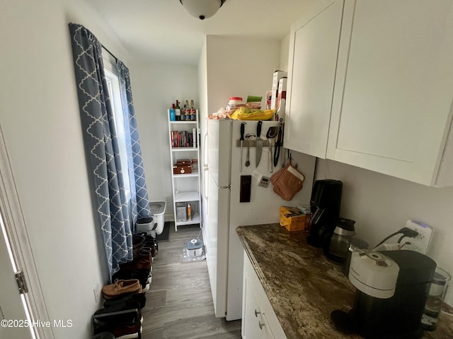 mudroom with wood finished floors