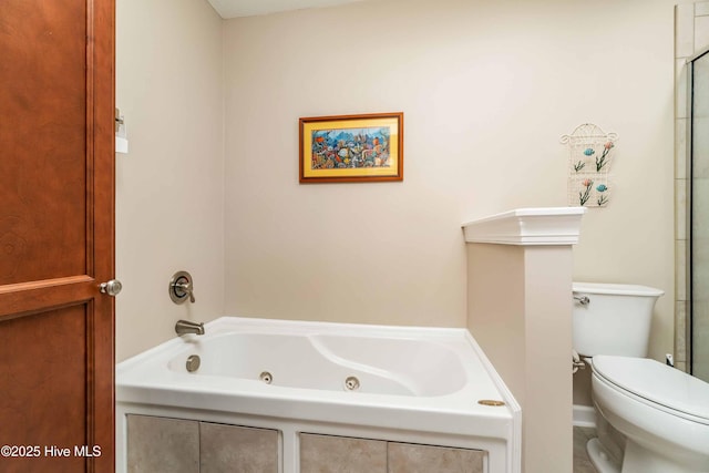 full bathroom featuring toilet and a whirlpool tub