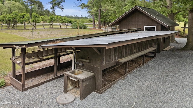 exterior space featuring view of scattered trees