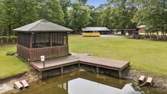 dock featuring a lawn