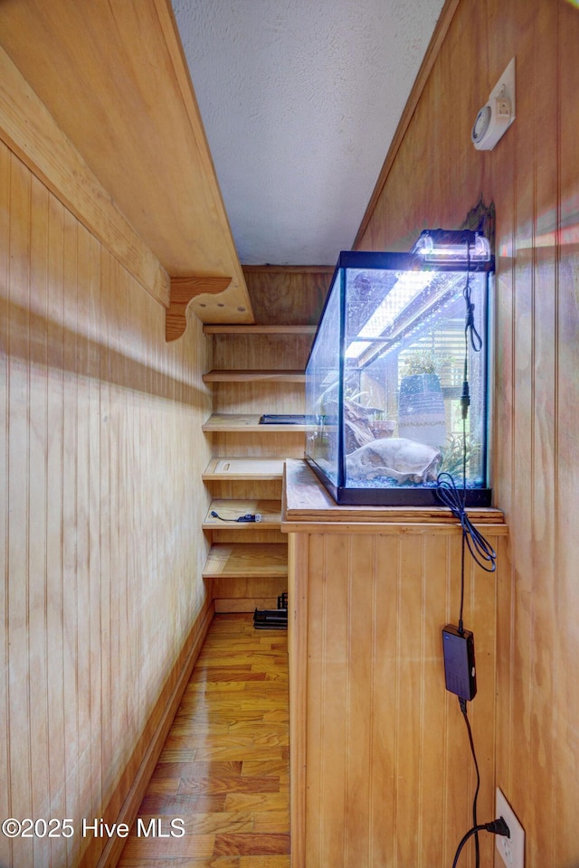spacious closet with wood finished floors