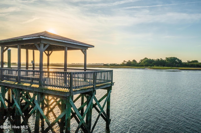 dock area with a water view and a gazebo