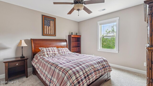 216 National Dr, Pinehurst, NC 28374 - bedroom with carpet, baseboards, and ceiling fan