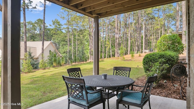 216 National Dr, Pinehurst, NC 28374 - view of patio / terrace featuring outdoor dining area
