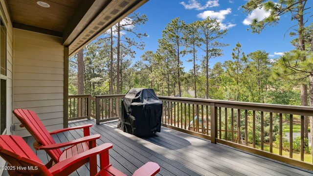 216 National Dr, Pinehurst, NC 28374 - wooden deck with a grill