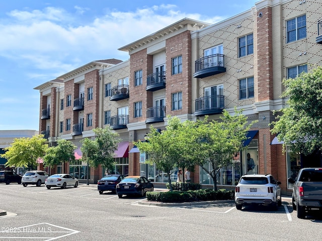 6832 Main St Unit 317, Wilmington, NC 28405 - view of property with uncovered parking