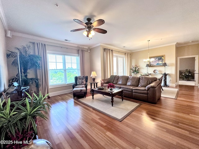 6832 Main St Unit 317, Wilmington, NC 28405 - living room featuring plenty of natural light, wood finished floors, ceiling fan, and a chandelier