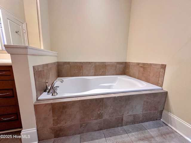 6832 Main St Unit 317, Wilmington, NC 28405 - full bathroom with vanity, a garden tub, and tile patterned floors
