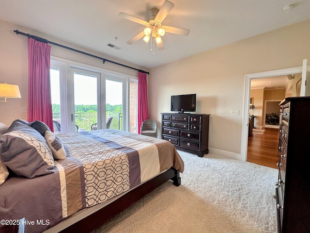 6832 Main St Unit 317, Wilmington, NC 28405 - bedroom featuring access to exterior, carpet flooring, and a ceiling fan